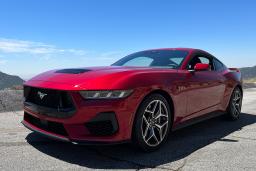2024 Ford Mustang GT in red.